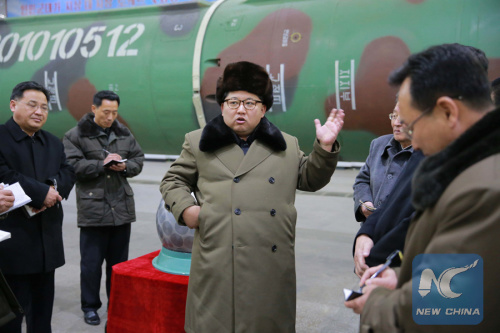 Photo provided by Korean Central News Agency (KCNA) on March 9, 2016 shows top leader of the Democratic People's Republic of Korea (DPRK) Kim Jong Un recently meeting with the scientists and technicians in the field of nuclear weapons and guiding the work for boosting the nuclear arsenal. Kim Jong Un said his country's nuclear warheads have been standardized to be fit for ballistic missiles through miniaturization, the official KCNA news agency reported Wednesday. (Xinhua/KCNA)