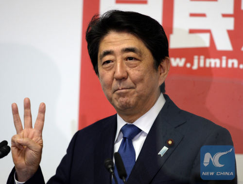 Japanese Prime Minister and ruling Liberal Democratic Party (LDP) President Shinzo Abe gestures at the LDP lawmakers meeting in Tokyo on Sept. 24, 2015. Abe remained the party's president, announced by the LDP in the meeting on Thursday. (Xinhua/Ma Ping)