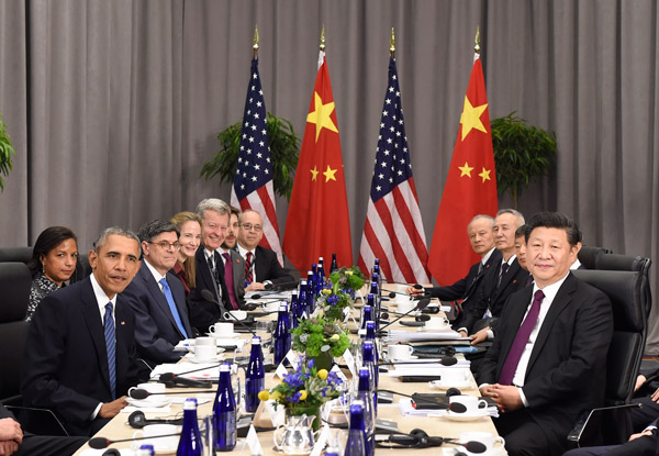Chinese President Xi Jinping (1st R) meets with his U.S. counterpart Barack Obama (1st L) on the sidelines of the fourth Nuclear Security Summit in Washington DC, the United States, March 31, 2016. (Photo/Xinhua)