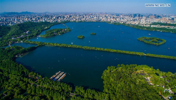 This aerial photo taken on May 12, 2015 shows the West Lake in Hangzhou, capital of east China's Zhejiang Province. China will host the 2016 Group of Twenty (G20) summit in the eastern city of Hangzhou, a tourism city best known for its West Lake scenic spot, on Sept. 4-5. (Photo: Xinhua/Xu Yu)