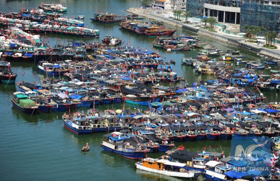 Fishing boats berth at a whart in Sanya, south China's Hainan Province, May 16, 2016. China banned fishing from May 16 to Aug. 1 in the South China Sea, a measure taken for the 18th consecutive year. (Photo: Xinhua/Sha Xiaofeng)