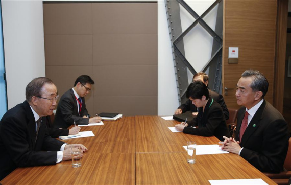 Chinese Foreign Minister Wang Yi (1st R) meets with the United Nations Secretary-General Ban Ki-moon (1st L) in Paris, capital of France, on June 3, 2016. (Photo; Xinhua/Ye Pingfan)