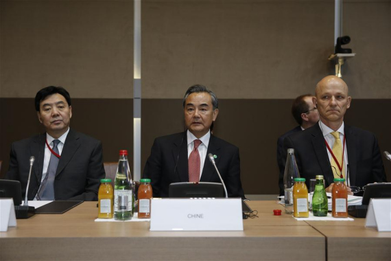 Chinese Foreign Minister Wang Yi (C) attends Peace Initiatives in the Middle East Conference in Paris, capital of France, on June 3, 2016. (Photo: Xinhua/Ye Pingfan)