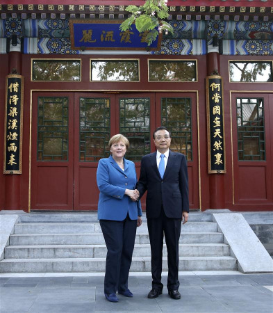 Chinese Premier Li Keqiang (R) meets with German Chancellor Angela Merkel on her visit to China for the fourth round of China-Germany intergovernmental consultation in Beijing, capital of China, June 12, 2016. (Photo: Xinhua/Pang Xinglei)