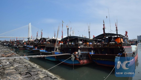 Fishing boats berth at a whart in Haikou, capital of south China's Hainan Province, May 16, 2016. China banned fishing from May 16 to Aug. 1 in the South China Sea, a measure taken for the 18th consecutive year. (Xinhua/Guo Cheng)