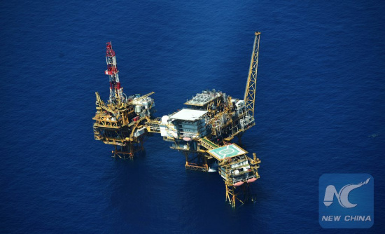 An aerial photo taken on Sept. 25, 2015 from a seaplane of Hainan Maritime Safety Administration shows the Yacheng 13-1 drilling rig during a patrol in South China Sea. (Xinhua/Zhao Yingquan)