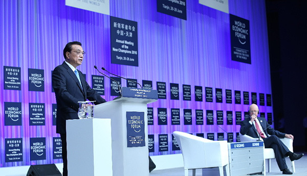 Premier Li Keqiang delivers a keynote speech at the opening of the annual Meeting of the New Champions in Tianjin on June 27, 2016. (Photo / Xinhua)