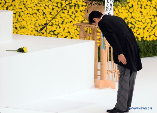 Japanese Prime Minister Shinzo Abe attends the ceremony marking the 71st anniversary of Japan's unconditional surrender in World War II in Tokyo, Japan, Aug. 15, 2016. (Xinhua/Ma Ping)