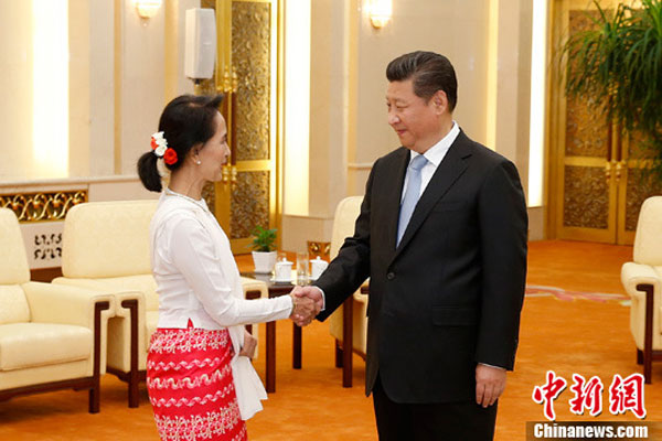 Chinese President Xi Jinping (R) meets with a delegation from Myanmar's National League for Democracy (NLD), headed by NLD chair Aung San Suu Kyi, at the Great Hall of the People in Beijing, China, June 11, 2015. (CNS photo/Sheng Jiapeng)