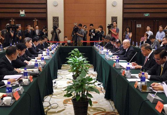 Zhang Zhijun (3rd L), head of the State Council Taiwan Affairs Office, meets with a delegation of county and city officials from Taiwan in Beijing, capital of China, Sept. 18, 2016. (Xinhua/Chen Yehua)
