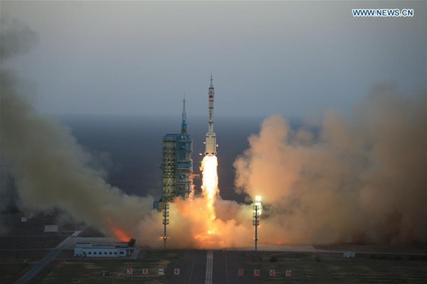 The Long March-2F carrier rocket carrying China's Shenzhou-11 manned spacecraft blasts off from the launch pad at the Jiuquan Satellite Launch Center in Jiuquan, northwest China's Gansu Province, Oct. 17, 2016. (Photo: Xinhua/Li Gang)