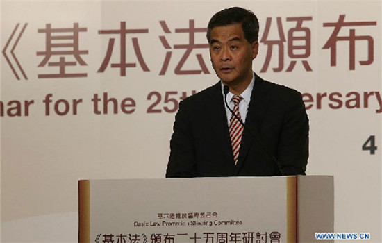 Hong Kong Chief Executive Leung Chun-ying speaks at a seminar for the 25th anniversary of the promulgation of the Basic Law in Hong Kong, April 4, 2015. (Photo/Xinhua)