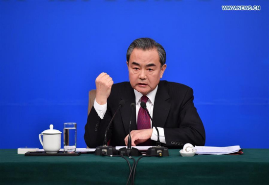Chinese Foreign Minister Wang Yi answers questions on China's foreign policy and foreign relations at a press conference for the fifth session of the 12th National People's Congress in Beijing, capital of China, March 8, 2017. (Xinhua/Li Xin)