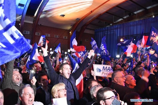 Marine Le Pen's supporters celebrate at a rally in Henin-Beaumont, France on April 23, 2017. (Xinhua/Chen Yichen)