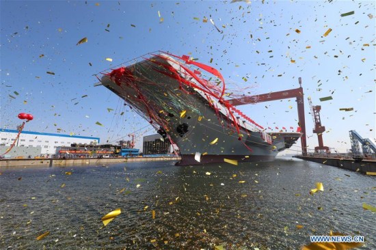 China's second aircraft carrier is transferred from dry dock into the water at a launch ceremony in Dalian shipyard of the China Shipbuilding Industry Corp. in Dalian, northeast China's Liaoning Province, April 26, 2017. The new carrier, the first domestically-built one, came after the Liaoning, a refitted former Soviet Union-made carrier that was put into commission in the Navy of the Chinese People's Liberation Army in 2012. (Xinhua/Li Gang)