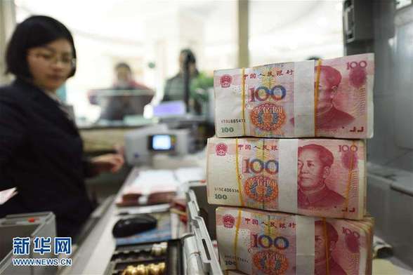 China should deleverage its economy at a proper pace to ensure the financial sector is under pressure to keep reducing leverage while avoiding being pushed into any systemic financial risks, according to a senior central bank official. (Xinhuanet file photo)