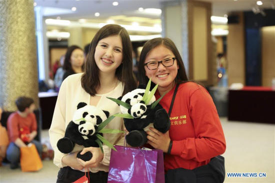U.S. students pose for photos during the Open Day - Experience China event at the Chinese Consulate General in New York, the United States, on May 5, 2017. (Xinhua/Wang Ying)