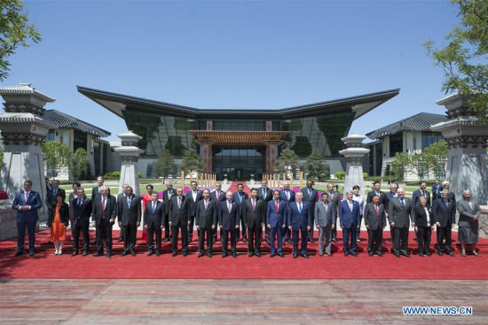 Chinese President Xi Jinping, foreign delegation heads and guests pose for a group photo at the Leaders' Roundtable Summit of the Belt and Road Forum (BRF) for International Cooperation at Yanqi Lake International Convention Center in Beijing, capital of China, May 15, 2017. (Xinhua/Yao Dawei)