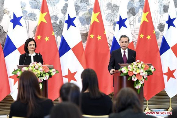 Chinese Foreign Minister Wang Yi and Isabel Saint Malo de Alvarado, Panama's vice president and foreign minister, attend a press conference after their meeting in Beijing, capital of China, June 13, 2017. China and Panama signed a joint communique Tuesday on the establishment of diplomatic relations. (Xinhua/Zhang Ling)