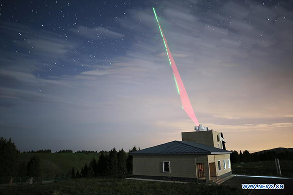 Composite photo taken on June 15, 2017 shows a quantum communication ground station in Urumqi, capital of Northwest China's Xinjiang Uygur autonomous region. (Photo/Xinhua)