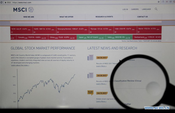 Photo taken on June 20, 2017 shows the website of global equity indexes provider MSCI on a computer in New York, theUnited States. Global equity indexes provider MSCI announced Tuesday that beginning in June 2018, it will include China A-shares in the MSCI Emerging Markets (EM) Index and the MSCI ACWI Index. (Xinhua/Wang Ying)