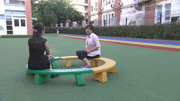 Zhang Yu (L) has made her decision not wanting a second child.  (Photo/CGTN)