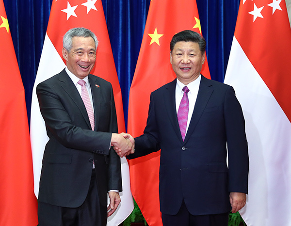 Chinese President Xi Jinping meets with Singaporean Prime Minister Lee Hsien Loong in Beijing on Sept 20, 2017. (Photo/Xinhua)