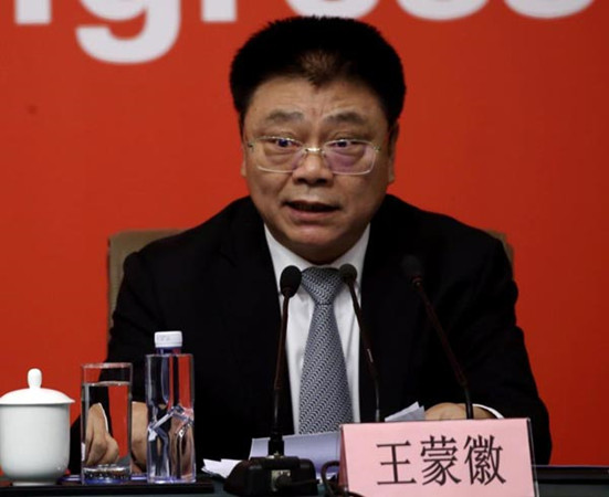 Wang Menghui, minister of housing and urban-rural development, speaks at a news conference of the 19th National Congress of the Communist Party of China in Beijing, Oct 22, 2017. (Photo by Edmond Tang/China Daily)