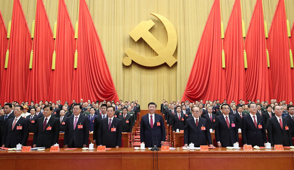 Xi Jinping presides over the closing session of the 19th CPC National Congress on Tuesday in the Great Hall of the People in Beijing. (Photo/Xinhua)