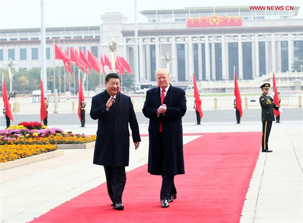 Chinese President Xi Jinping (L) holds a grand ceremony to welcome U.S. President Donald Trump at the square outside the east gate of the Great Hall of the People in Beijing, capital of China, Nov. 9, 2017. (Xinhua/Lan Hongguang)