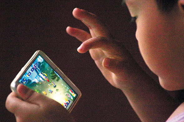 Chinese game developers have been asked to install an antiaddiction system in their games since 2007.(Provided to China Daily)