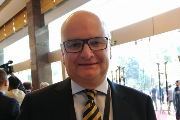 Jon Stanton, CEO of The Weir Group PLC, poses for a photo at the Fortune Global Forum in Guangzhou, South China's Guangdong province, Dec 6, 2017. Photo by Lu Haoting/chinadaily.com.cn