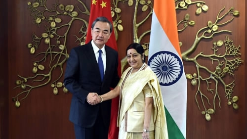 Chinese Foreign Minister Wang Yi meets his Indian counterpart Sushma Swaraj in New Delhi, Dec. 11, 2017. (Photo/CGTN) 