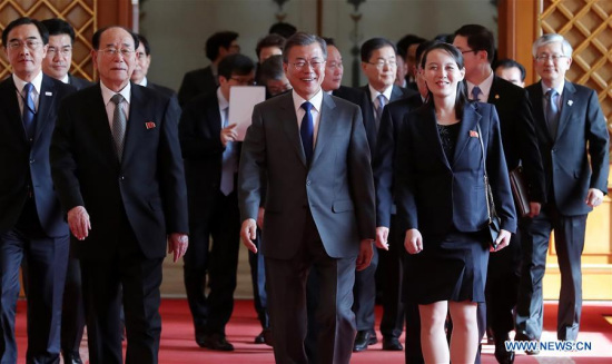 South Korean President Moon Jae-in (front C) walks with Kim Yong Nam (front L), president of the Presidium of the Supreme People's Assembly of the Democratic People's Republic of Korea (DPRK), and Kim Yo Jong (front R), the younger sister of top DPRK leader Kim Jong Un, at the Blue House in Seoul, capital of South Korea, on Feb. 10, 2018. (Xinhua/Newsis)
