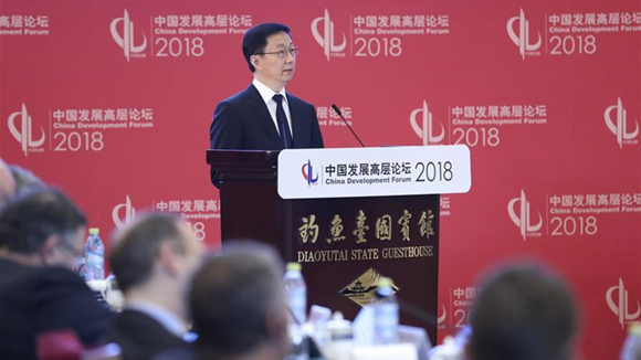 Chinese Vice Premier Han Zheng, also a member of the Standing Committee of the Political Bureau of the Communist Party of China Central Committee, delivers a speech at the opening ceremony of the China Development Forum in Beijing, March 25, 2018.  (Photo//Xinhua)
