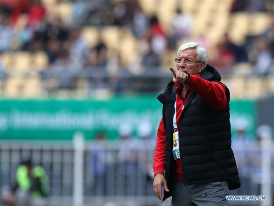Marcello Lippi, head coach of China, gives insturctions during the match between China and the Czech Republic at the 2018 China Cup International Football Championship in Nanning, capital of south China's Guangxi Zhuang Autonomous Region, March 26, 2018. (Xinhua/Cao Can)