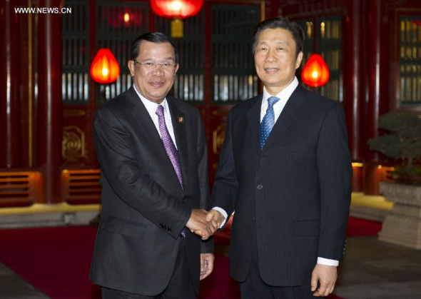 Chinese Vice President Li Yuanchao (R) meets with Cambodian Prime Minister Hun Sen in Beijing, capital of China, Nov. 7, 2014. Hun Sen arrives in Beijing Friday to attend the Dialogue on Strengthening Connectivity Partnership and the Asia-Pacific Economic Cooperation (APEC) meetings. (Xinhua/Xie Huanchi)