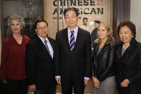 Sun Guoxiang (center), consul general of the Chinese Consulate General in New York, with members of the New York Historical Society and the Committee of 100 after Sun was given a tour of the museum's new Chinese American: Exclusion/Inclusion exhibit. From left: Marci Reaven, vice-president of historical exhibitions at the New York Historical Society, as well as the curator of the exhibit; Henry Tang, co-founder of the Committee of 100; Sun; Louise Mirrer, president and CEO of the New York Historical Society; Shirley Young, president of Shirley Young Associates. Amy He/China Daily.