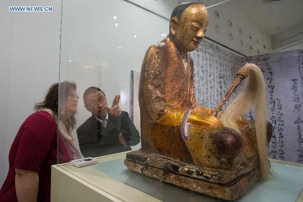 File photo taken on March 3, 2015 shows the Chinese Buddha statue at the Hungarian Natural History Museum in Budapest, Hungary. (Photo: Xinhua/Attila Volgyi)