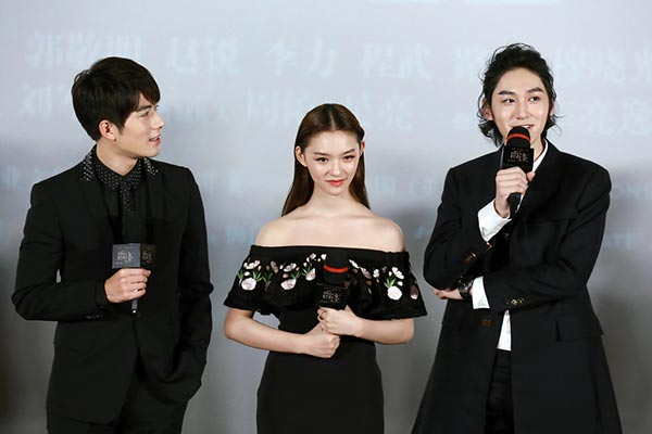 L.O.R.D: Legend of Ravaging Dynasties' cast members (from left to right) Chen Xuedong, Lin Yun and Wang Duo attend a Beijing media event. (Photo provided to China Daily)