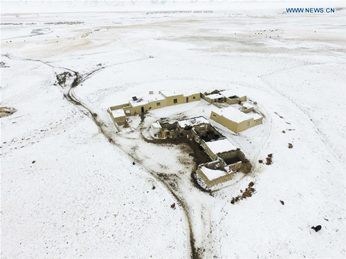 A damaged house is seen in Muji village, Akto County of northwest China's Xinjiang Uygur Autonomous Region, Nov. 26, 2016. About 130 herdsmen from Akto County, hit by a 6.7-magnitude earthquake Friday night, have been evacuated to a safer place, said local sources on Saturday. (Xinhua/Zhao Ge)  