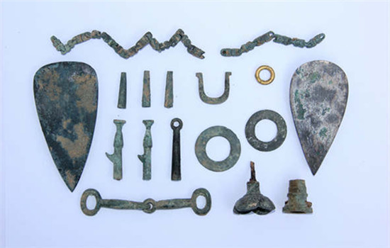 Cultural relics unearthed from an ancient sacrificial site in Fengxiang, Shaanxi province. (Provided To China Daily)