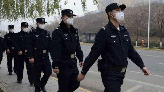 A new squad of environmental police patrol a street in Beijing to sniff out the sources of pollutants. (Photo/CGTN)