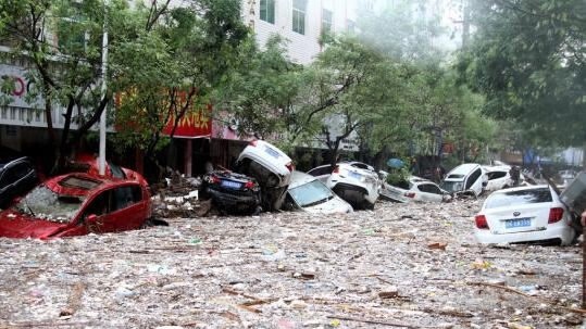 A massive flood hits Suide County in northwest China's Shaanxi Province. (Photo/CGTN)