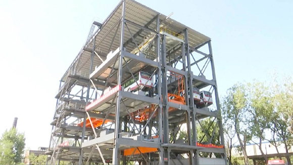 Beijing has began the construction of an automated vertical parking building for public buses.(Photo/Video screenshot from CGTN)