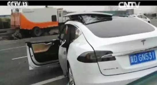 A Tesla Model S involved in a fatal crash on a highway near the city of Handan, Hebei Province, January 20, 2016. [Screenshot: CCTV]