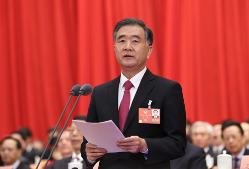 Wang Yang, a member of the Standing Committee of the Political Bureau of the Communist Party of China Central Committee and chairman of the National Committee of the Chinese People's Political Consultative Conference, speaks at the closing meeting of the first session of the 13th CPPCC National Committee at the Great Hall of the People in Beijing on Thursday. (Photo by Zou Hong/China Daily)