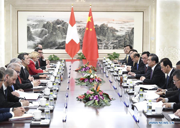 Chinese State Councilor and Foreign Minister Wang Yi and Swiss Federal Councillor and Foreign Minister Ignazio Cassis hold the first round of foreign ministerial strategic talks between the two countries in Beijing, capital of China, April 3, 2018. (Xinhua/Yan Yan)