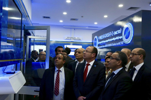 Mohamed Ben Amor, secretary-general of the Arab Information and Communication Technologies Organization (front, second from left), tours the China-Arab Beidou System/Global Navigation Satellite System Center in Tunis, Tunisia, on Tuesday. (Photo/Xinhua)