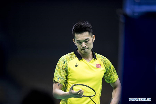 Lin Dan of China reacts during the men's singles first round match against Chinese Taipei's Wang Tzu Wei at Badminton Asia Championships 2018 in Wuhan, capital of central China's Hubei Province, April 25, 2018. Lin Dan lost by 1-2. (Xinhua/Xiao Yijiu)